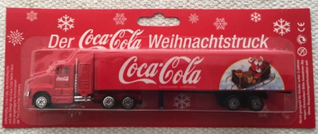 10132-2 € 6,00 coca cola vrachtwagen kerstman in arreslee 18 cm.jpeg